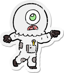 distressed sticker of a cartoon cyclops alien spaceman pointing
