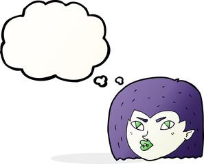 cartoon vampire face with thought bubble