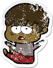 distressed sticker of a cartoon exhausted boy