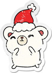 hand drawn christmas distressed sticker cartoon of kawaii polar bear