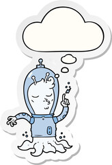 cartoon alien with thought bubble as a printed sticker