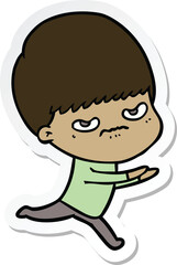 sticker of a cartoon angry boy