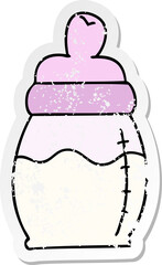 distressed sticker of a quirky hand drawn cartoon baby milk bottle