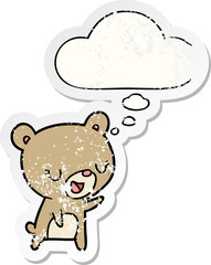 cartoon bear with thought bubble as a distressed worn sticker