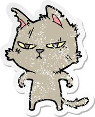 distressed sticker of a tough cartoon cat