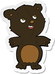 sticker of a cartoon happy little black bear