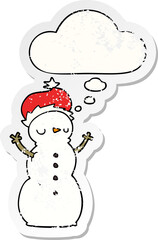 cartoon snowman with thought bubble as a distressed worn sticker