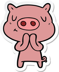 sticker of a cartoon content pig