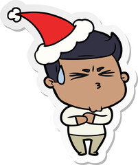 hand drawn sticker cartoon of a frustrated man wearing santa hat