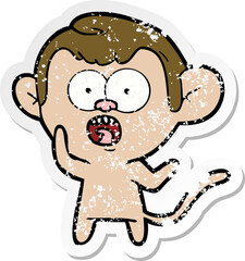 distressed sticker of a cartoon shocked monkey