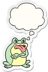 grumpy cartoon frog with thought bubble as a printed sticker