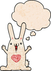 cartoon rabbit in love with thought bubble in grunge texture style