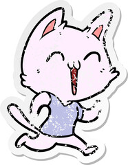 distressed sticker of a happy cartoon cat