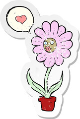retro distressed sticker of a cartoon flower