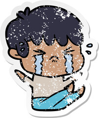 distressed sticker of a cartoon boy crying