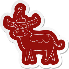 quirky cartoon  sticker of a bull wearing santa hat