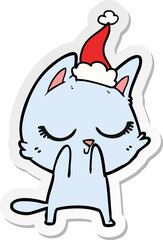 calm hand drawn sticker cartoon of a cat wearing santa hat