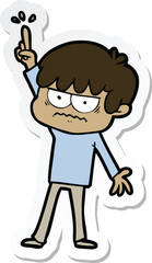 sticker of a annoyed cartoon boy