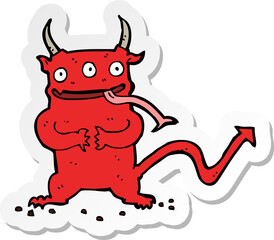 sticker of a cartoon little demon