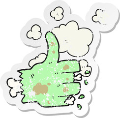 retro distressed sticker of a cartoon zombie hand