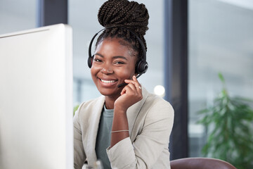 Call center, portrait and black woman smile by computer for telemarketing, customer service or...