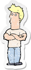 retro distressed sticker of a cartoon man with folded arms