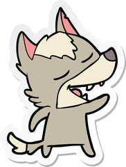 sticker of a cartoon wolf laughing