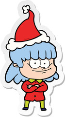 hand drawn sticker cartoon of a smiling woman wearing santa hat