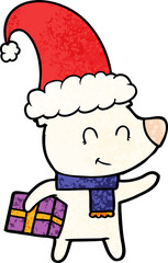 female polar bear with christmas present