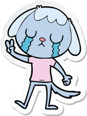 sticker of a cute cartoon dog crying