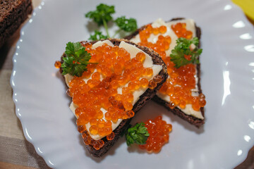Salmon eggs - tasty and healthy red caviar
