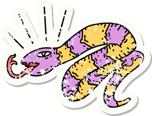 worn old sticker of a tattoo style hissing snake