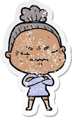 distressed sticker of a cartoon annoyed old lady