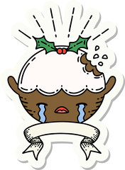 sticker of a tattoo style christmas pudding character crying