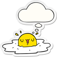 cartoon fried egg with thought bubble as a printed sticker