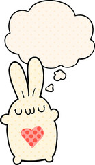 cute cartoon rabbit with love heart with thought bubble in comic book style