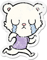 distressed sticker of a crying polar bear cartoon