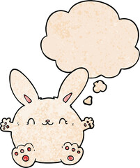 cute cartoon rabbit with thought bubble in grunge texture style