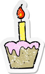 retro distressed sticker of a cartoon cupcake
