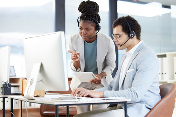 Call center, coaching and black woman with employee on computer for learning customer service work. Training, tablet and man with mentor for telemarketing, teamwork or collaboration of sales agents.