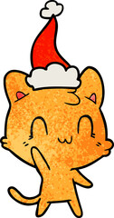 hand drawn textured cartoon of a happy cat wearing santa hat