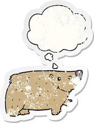 cartoon bear with thought bubble as a distressed worn sticker