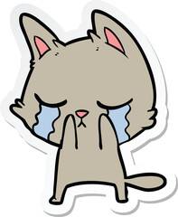 sticker of a crying cartoon cat
