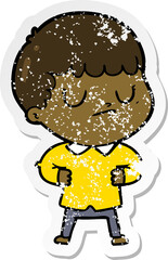 distressed sticker of a cartoon grumpy boy