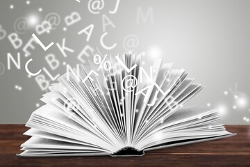 Open book with many letters. Dyslexia concept