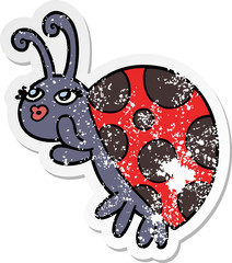 distressed sticker of a cartoon ladybug