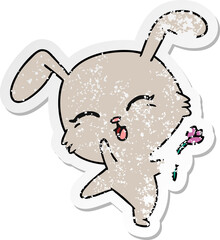 freehand drawn distressed sticker cartoon of cute kawaii bunny