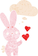 cute cartoon rabbit with love hearts with thought bubble in grunge distressed retro textured style