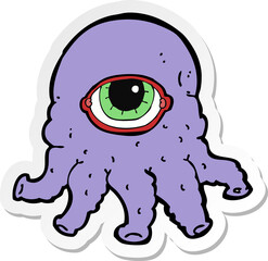 sticker of a cartoon alien head