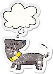cartoon dog with thought bubble as a distressed worn sticker